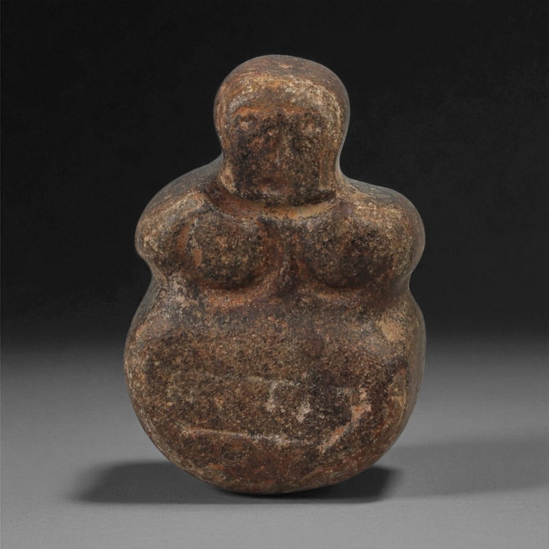 A Near Eastern Stone Anthropomorphic Figurine, 3rd-2nd Millennium BCE, 65LD (1 of 2)