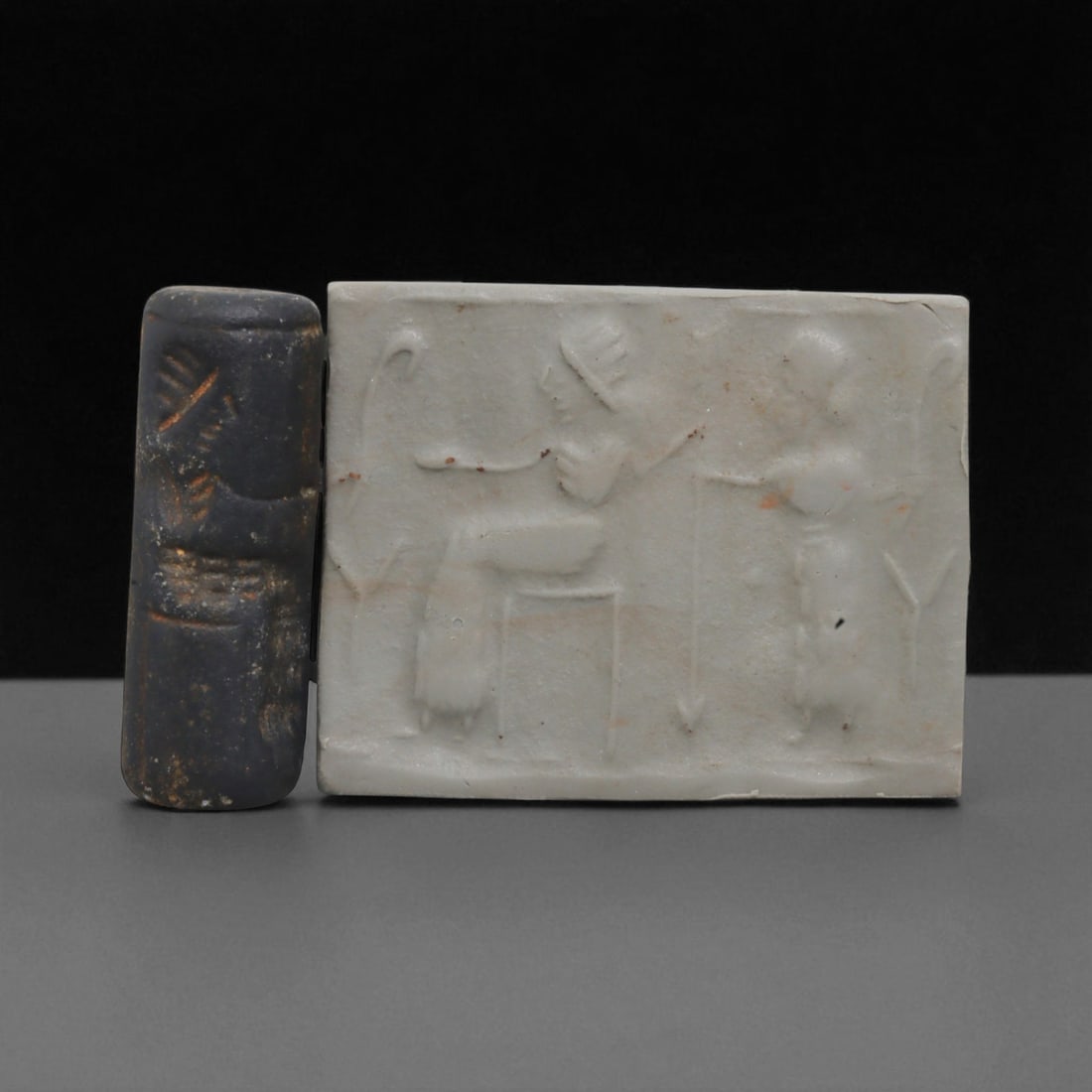 A Mesopotamian Stone Cylinder Seal, 3rd-2nd Millennium BCE, 4cm, 66BL: This authentic cylinder seal from ancient Mesopotamia dates to the 2nd to 1st millennium BCE, a time when the art of carving miniature narratives on stone reached remarkable levels of refinement. Seal