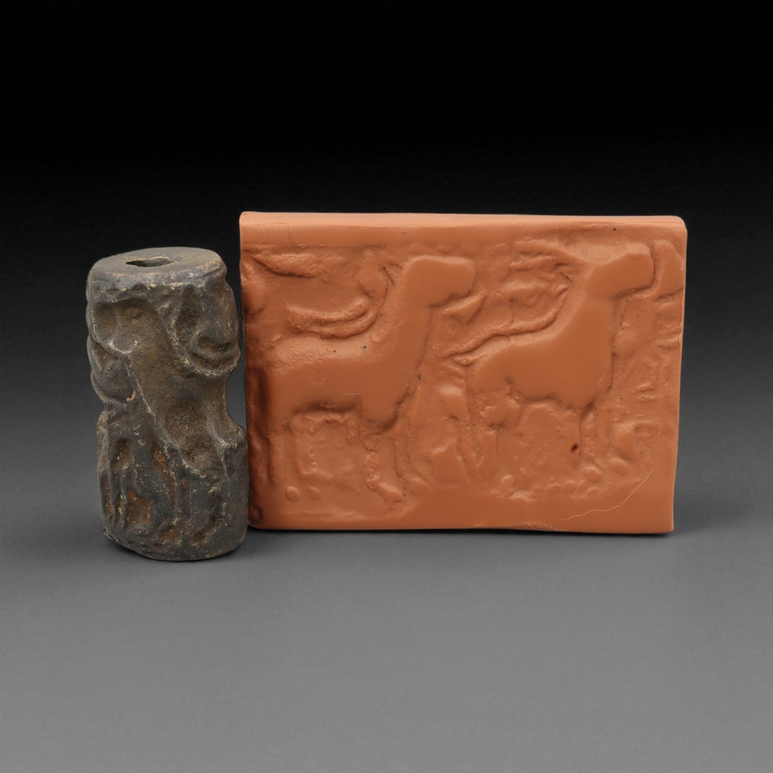 Ancient Neo-Babylonian Processional Animal Bronze Cylinder Seal, c. 7th-6th Century BCE, 3.5cm, 49DB: This compact yet finely cast bronze cylinder seal dates to the Neo-Babylonian period, c. 7th-6th century BCE - an age that witnessed the grandeur of Nebuchadnezzar II's empire and the flourishing of a