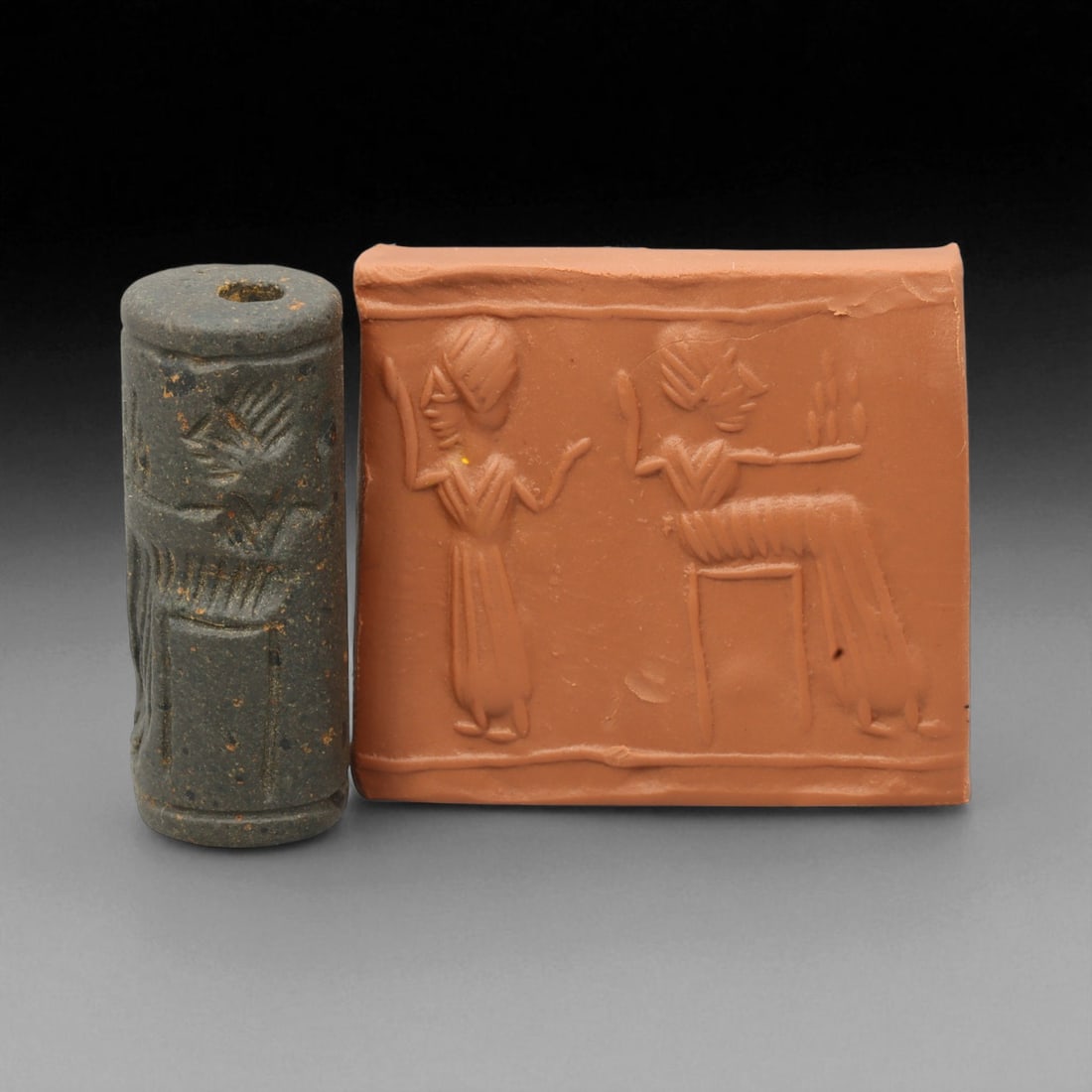 A Mesopotamian Stone Cylinder Seal, 3rd-2nd Millennium BCE, 3.8cm, 56DJ: This authentic cylinder seal from ancient Mesopotamia dates to the 2nd to 1st millennium BCE, a time when the art of carving miniature narratives on stone reached remarkable levels of refinement. Seal
