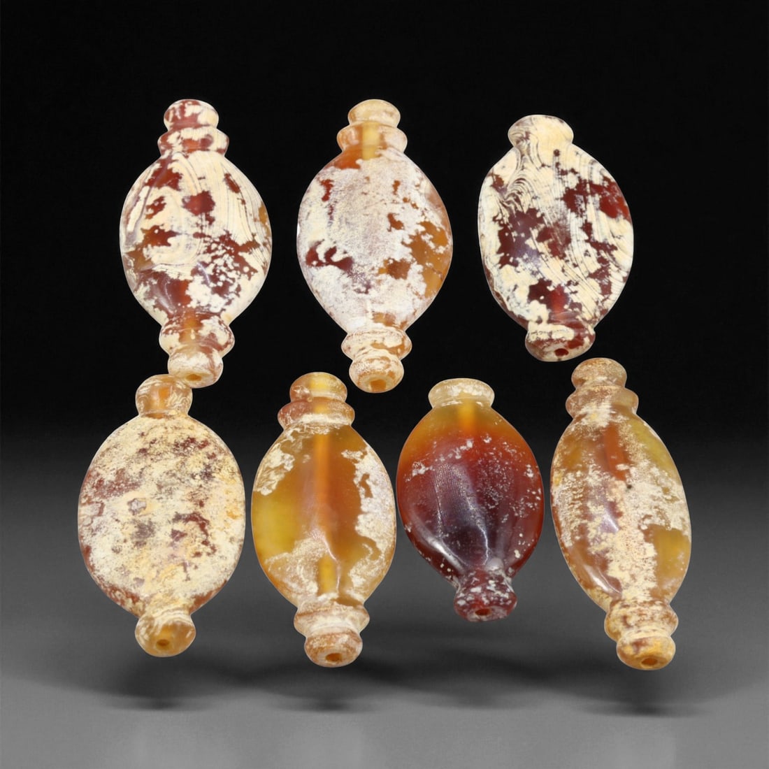 Ancient Persian Banded Carnelian Barrel Beads Set, c. 550-330 BCE, 3.8-5 cm, 28EB: This refined group of six elongated barrel-shaped beads originates from the Achaemenid Persian Empire, c. 550-330 BCE - a period celebrated for its mastery of stonework, luxury craftsmanship, and harm