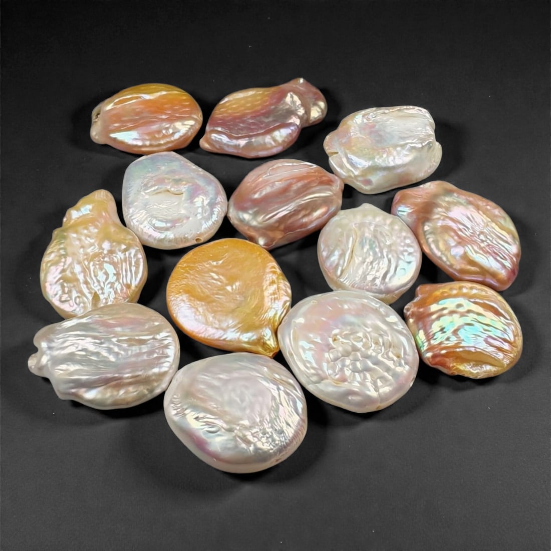 28.4 Grams Iridescent Multicolor Keshi Pearl Selection - Natural Freshwater Cultured Lot, 45WA: This luminous selection of cultured freshwater keshi pearls showcases a captivating array of natural iridescence, blending soft pink, golden, and silvery overtones with opalescent surface reflections.