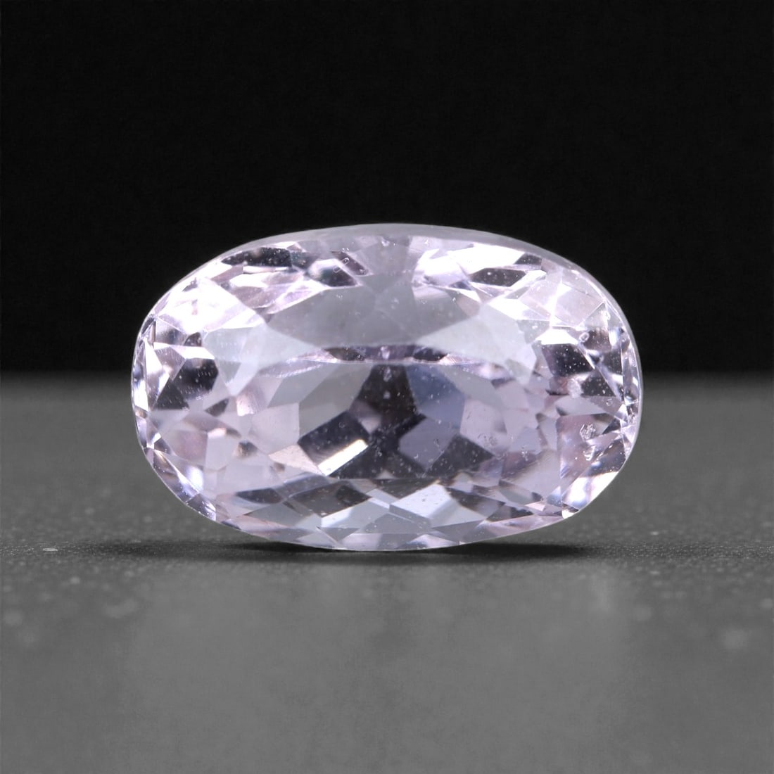 6.94 Carat Kunzite - Precision Oval with Excellent Depth, 76XB: This elegant 6.94 carat kunzite offers a beautiful blend of size, brilliance, and proportion. Cut into a well-balanced elongated oval, the gem measures 13.2 x 8.6 x 8.6 mm, maximizing both face-up pre