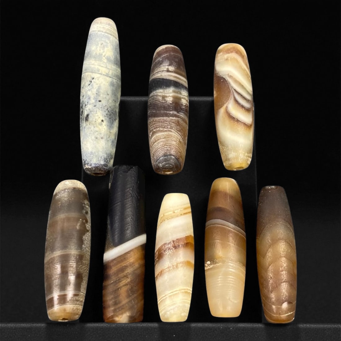 Ancient Medieval Tibetan Chung Dzi Agate Beads, c. 12th-15th Century CE, 1.9-2.2cm, 31EN: These striking ancient medieval beads originate from the highland regions of Tibet, dating between the 12th and 15th centuries CE. Known as Chung Dzi (junior or subsidiary dzi), they were crafted from