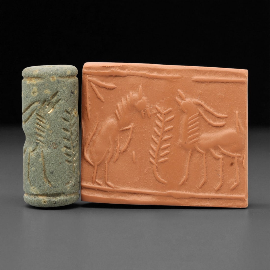 Ancient Mesopotamian Akkadian Steatite Cylinder Seal, c. 2300-2100 BCE, 4.2cm, 79EV: Carved from fine dark steatite, this ancient Akkadian cylinder seal dates to the late 3rd millennium BCE, a period when Mesopotamian artisans perfected the art of miniature relief engraving. Each seal