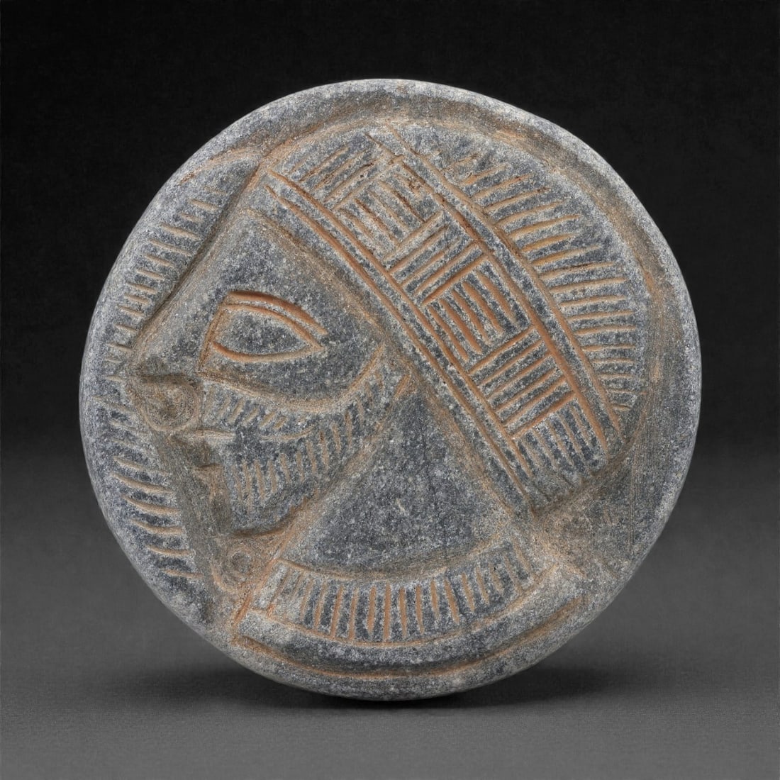 An Egyptian Stone Plaque with Male Profile, New Kingdom, 1550-1070 BCE, 19LM (1 of 2)