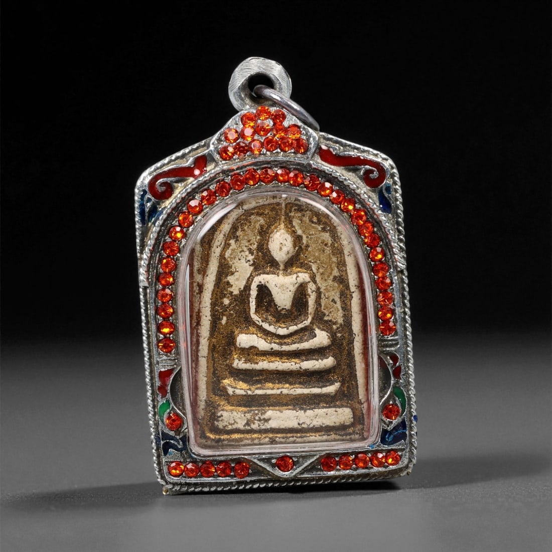Vintage Thai Buddhist Amulet in Ornate Framed Setting, 20th Century , 6cm, 85WF: This vintage Thai Buddhist amulet exemplifies the devotional artistry that continues to define Thailand's sacred craftsmanship. Encased within an intricately detailed frame, the amulet displays refine