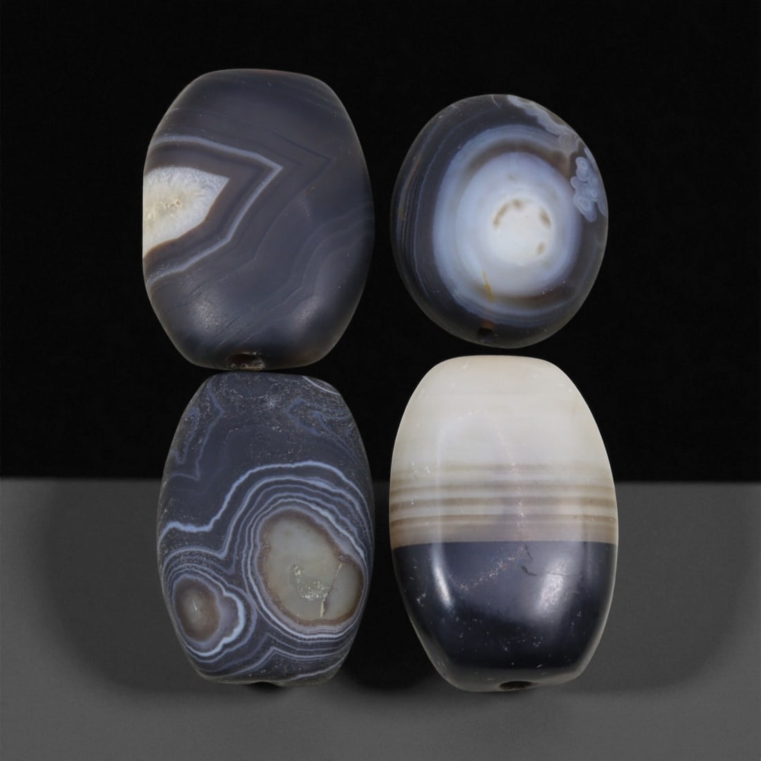 Ancient Medieval Sulaimani Agate Beads, c. 11th-14th Century CE, 2.8-3cm, 62EL: This elegant group of Sulaimani agate beads originates from the Indo-Persian cultural sphere of the 11th-14th centuries CE, a period when trade and craftsmanship flourished across Central and South As
