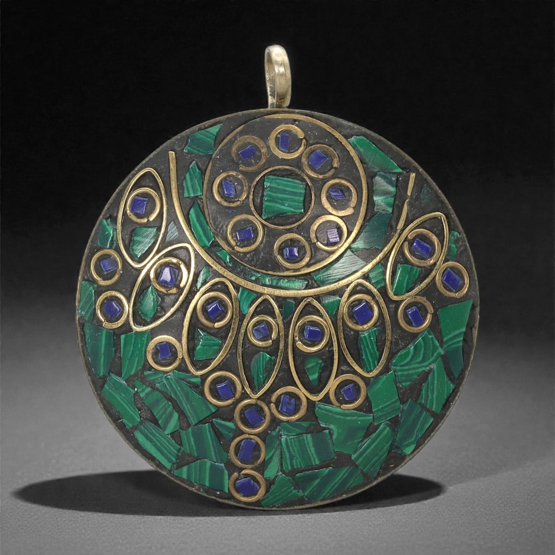 Himalayan Style Brass Pendant - Malachite Lapis Mosaic Amulet, 11XF: This circular brass pendant is composed of a dense mosaic of malachite fragments forming a deep green ground. Overlaid upon the surface is an intricate network of gilt borders creating concentric ring