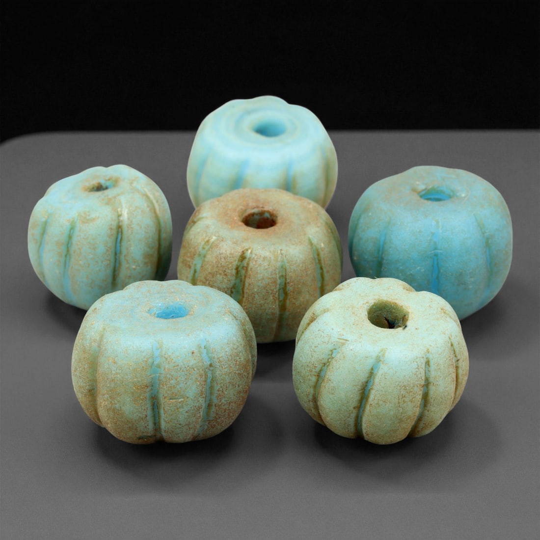 Antique Chinese Melon Form Glass Bead c. 18th-19th Century 2cm, 77ET: This antique Chinese melon form glass bead represents a popular aesthetic of the Qing period, when craftsmen produced richly colored ornaments inspired by natural motifs. The rounded, lobed silhouette