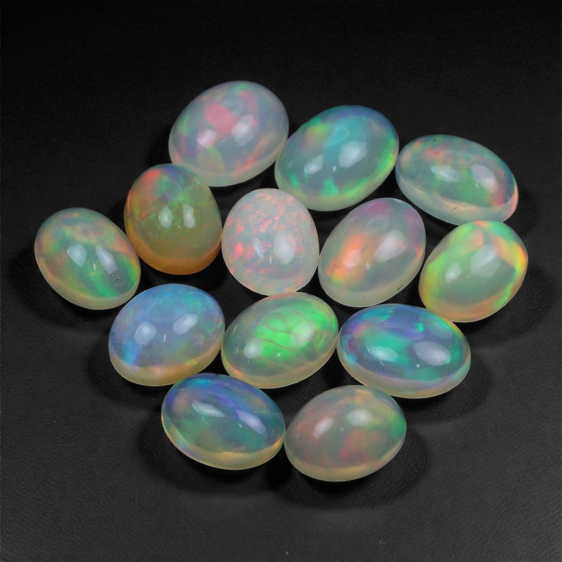16.79 Carats Oval Cabochon Opal Lot - Natural Ethiopian Stones - 9 to 10mm, 63XA (1 of 1)
