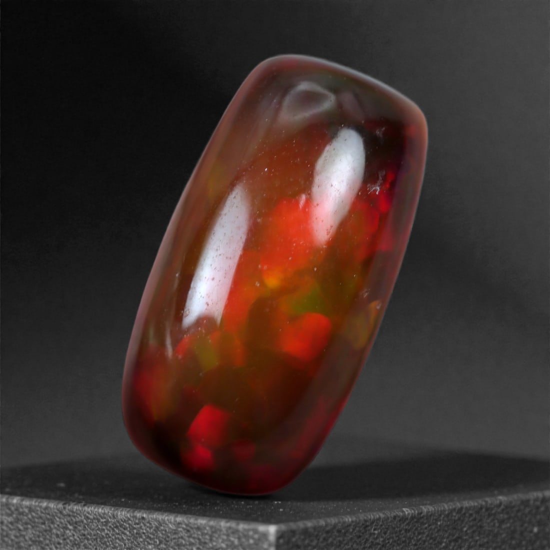 3.16 Carats Natural Welo Origin Smoked Black Opal Cabochon Gems, 14x7mm, 96XA: This natural smoked black opal hails from the Welo region of Ethiopia, a source renowned for producing some of the world's most visually captivating opals. Through a careful and controlled smoking pro