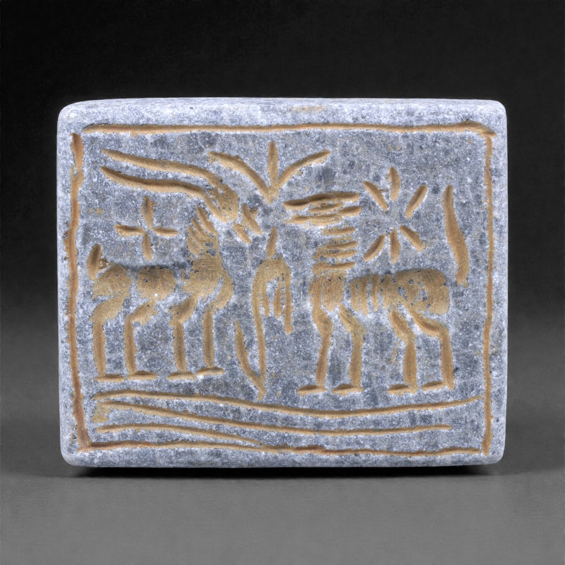 A Near Eastern Stone Plaque with Animal Motifs, Early 1st Millennium BCE, 64Q (1 of 2)