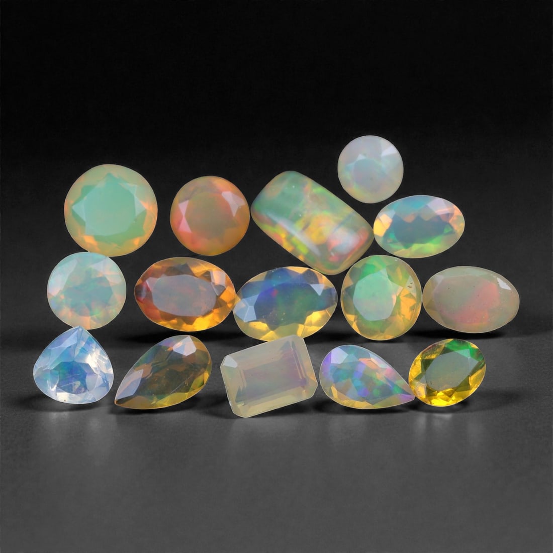 4.73 Carats Faceted Opal Lot - Natural Ethiopian Stones - 4 to 8mm, 6XA: This vibrant assortment of faceted Ethiopian opals dazzles with a rich spectrum of play-of-color, ranging from neon green and orange to flashes of violet, red, and golden yellow. The clarity varies fr