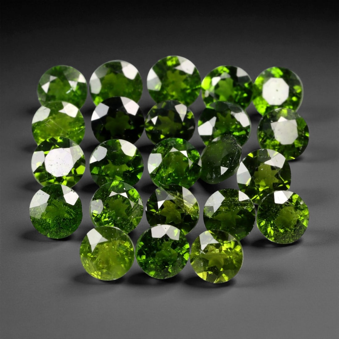 6.39 Carats Deep Forest Green Chrome Diopside Parcel - Natural Russian Stones - 3.9 x 2.6 mm, 60XE: This glowing parcel of chrome diopside gems displays a rich forest green hue, with velvety depth and natural brilliance. Each round-cut stone is faceted for optimal sparkle, capturing the vivid fire a