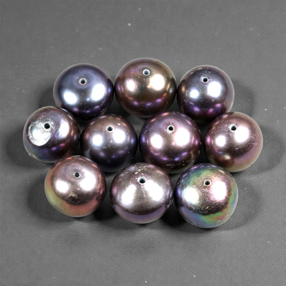 9.00 Grams Peacock Black Cultured Pearl Selection - Color Enhanced Round Beads, 62LK: This richly hued selection of cultured pearls captivates with a luxurious array of peacock black, aubergine, and violet tones. Their iridescent surfaces shimmer with undertones of green, blue, and bro