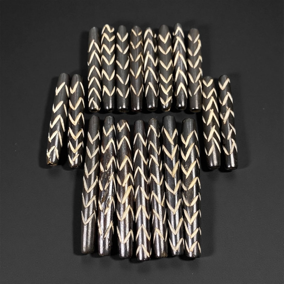 Mid-20th Century Tibetan Hand-Carved Wood Beads, 3.6-4.9cm, 59EP: A collection of Tibetan wood beads, each individually carved and polished, showcasing the natural beauty of the dark-stained grain with contrasting pale surface decoration. These mid-century examples 