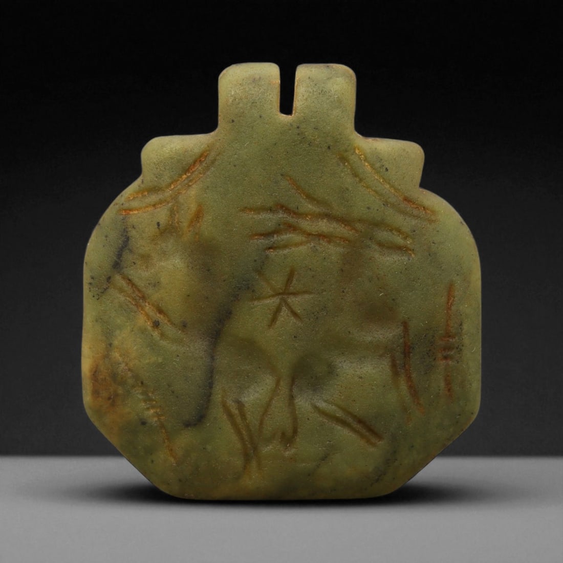 Ancient Neo-Assyrian Greenstone Horse Amulet Pendant, c. 9th-7th Century BCE, 4.5cm, 74DQ: This finely carved greenstone amulet dates to the Neo-Assyrian Empire, one of the most powerful and artistically advanced civilizations of the ancient Near East. Flourishing between the 9th and 7th ce