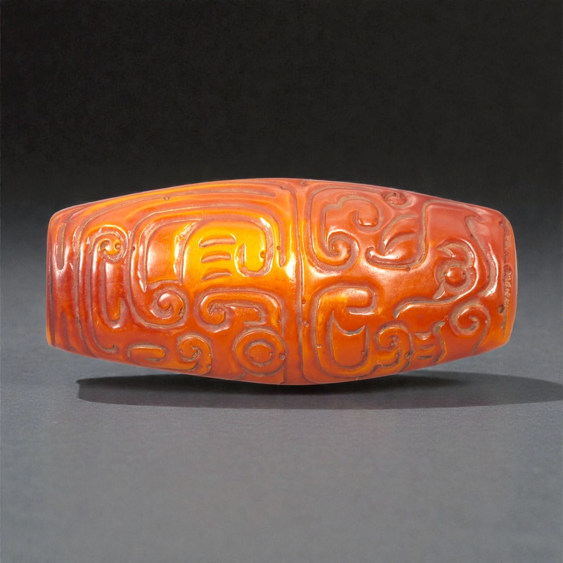 A Chinese Amber Resin Carved Bead, 20th Century, 20FC (1 of 3)