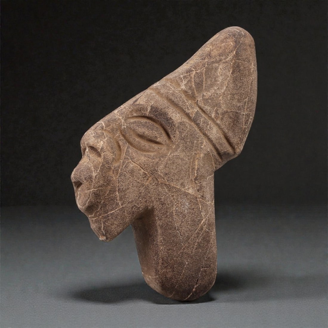 A Near Eastern Stone Anthropomorphic Head, Late 2nd-1st Millennium BCE, 7ZF (1 of 2)