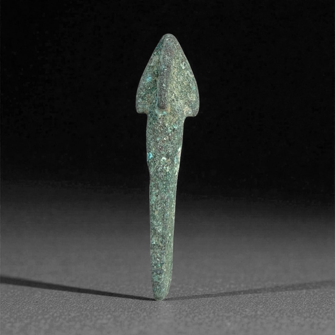An Ancient Bronze Barbed Arrowhead, 2nd-1st Millennium BCE, 4 g, 56BB (1 of 2)