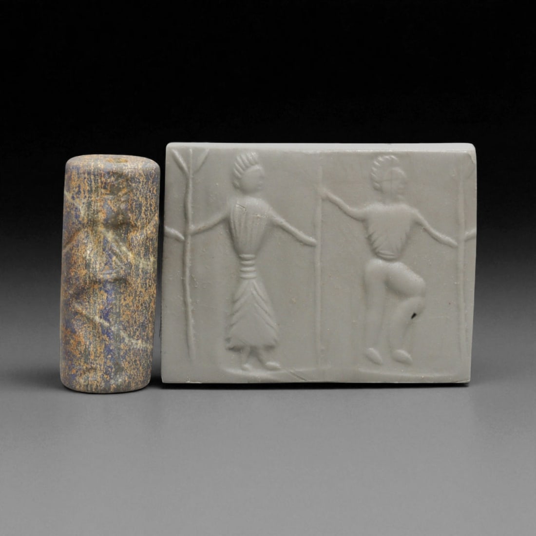 A Mesopotamian Stone Cylinder Seal, 3rd-2nd Millennium BCE, 3.2cm, 16BC: This authentic cylinder seal from ancient Mesopotamia dates to the 2nd to 1st millennium BCE, a time when the art of carving miniature narratives on stone reached remarkable levels of refinement. Seal