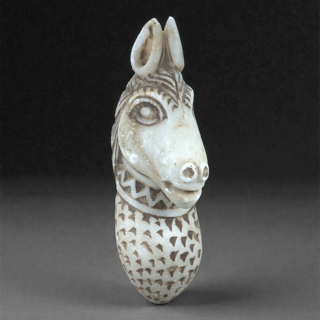 A Near Eastern Stone Horse-Head Finial, 1st Millennium CE, 1LN (1 of 4)