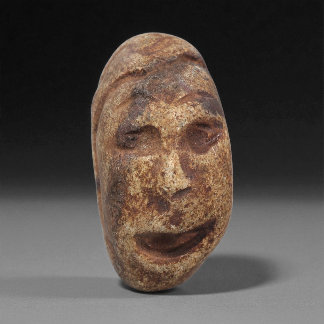 A Mediterranean Stone Maskette, 12th-17th Century, 95LC
