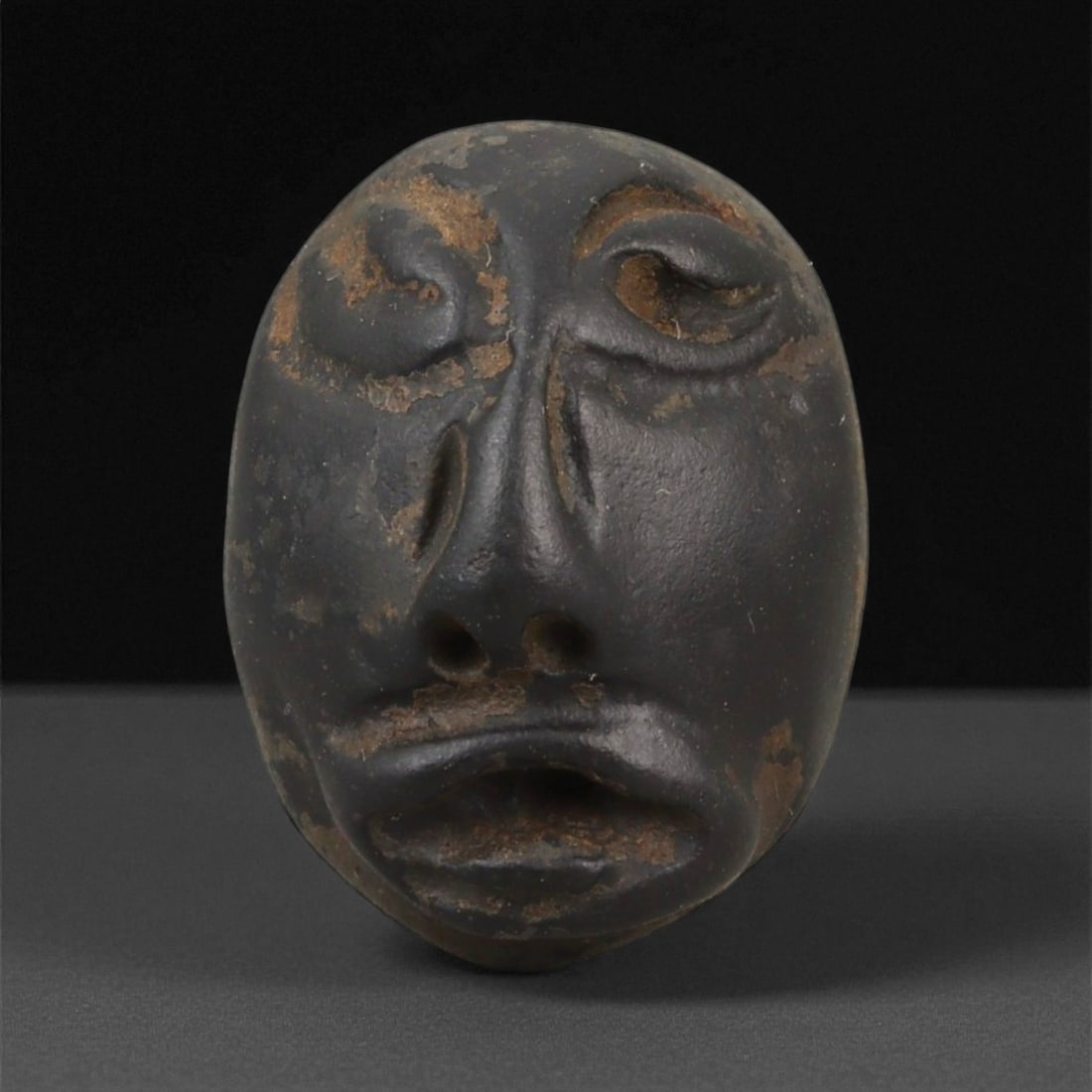 A Pre-Columbian Stone Maskette, 1st Millennium CE, 36LA (1 of 2)