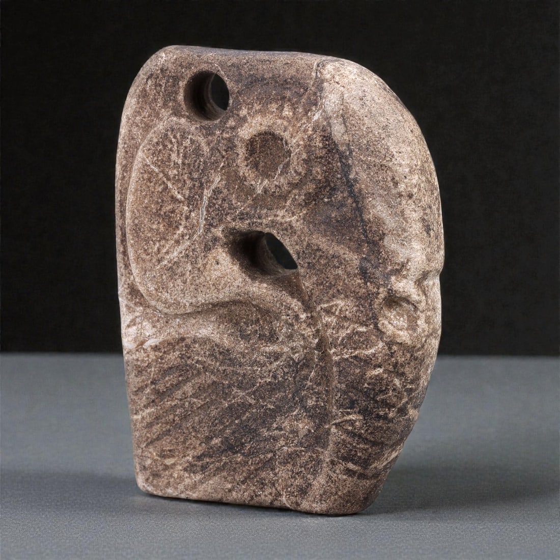 A Mesoamerican Stone Head Pendant, Pre-Columbian Period, 82R (1 of 2)