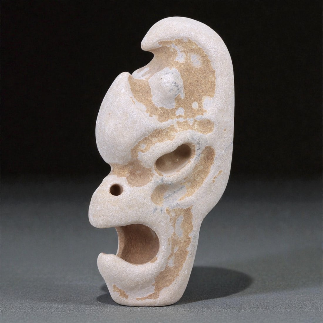 A Mesoamerican Stone Anthropomorphic Pendant, Pre-Columbian Period, 8T (1 of 2)