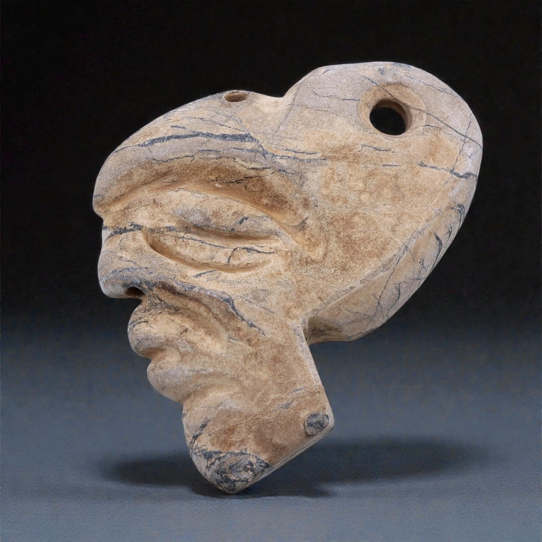 A Mesoamerican Stone Head Pendant, Pre-Columbian Period, 71T (1 of 2)