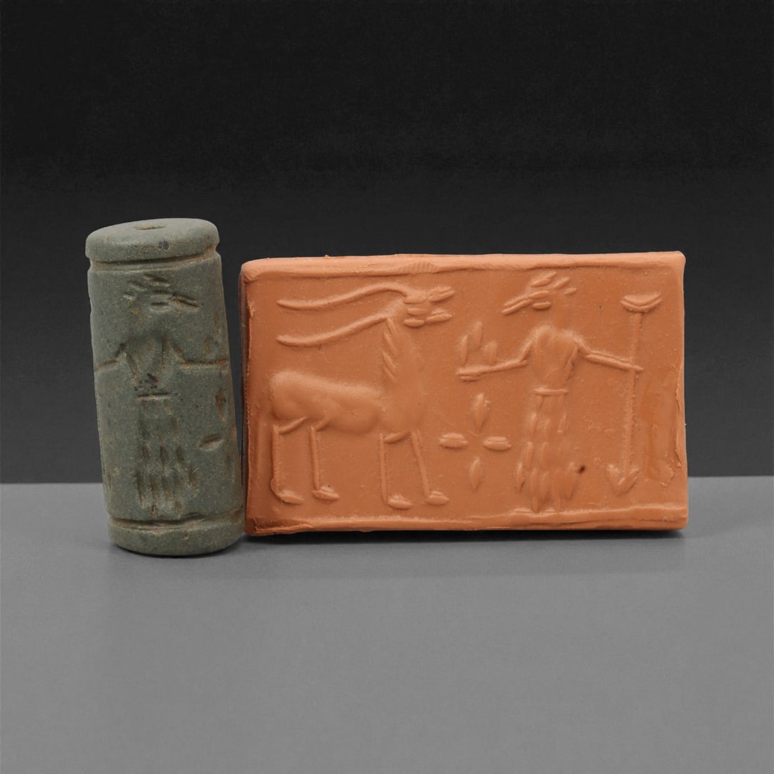 A Mesopotamian Stone Cylinder Seal, 3rd-2nd Millennium BCE, 3.8cm, 24M: This Mesopotamian cylinder seal dates to the 2nd-1st millennium BCE. Carved from stone, it would have been used to roll designs onto wet clay as a mark of ownership or identification. The seal fits co