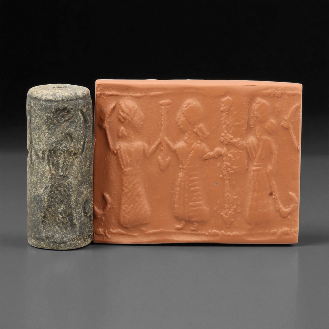 A Mesopotamian Stone Cylinder Seal, 3rd-2nd Millennium BCE, 4.7cm, 48EJ: This Mesopotamian cylinder seal dates to the 2nd-1st millennium BCE. Carved from stone, it would have been used to roll designs onto wet clay as a mark of ownership or identification. The seal fits co