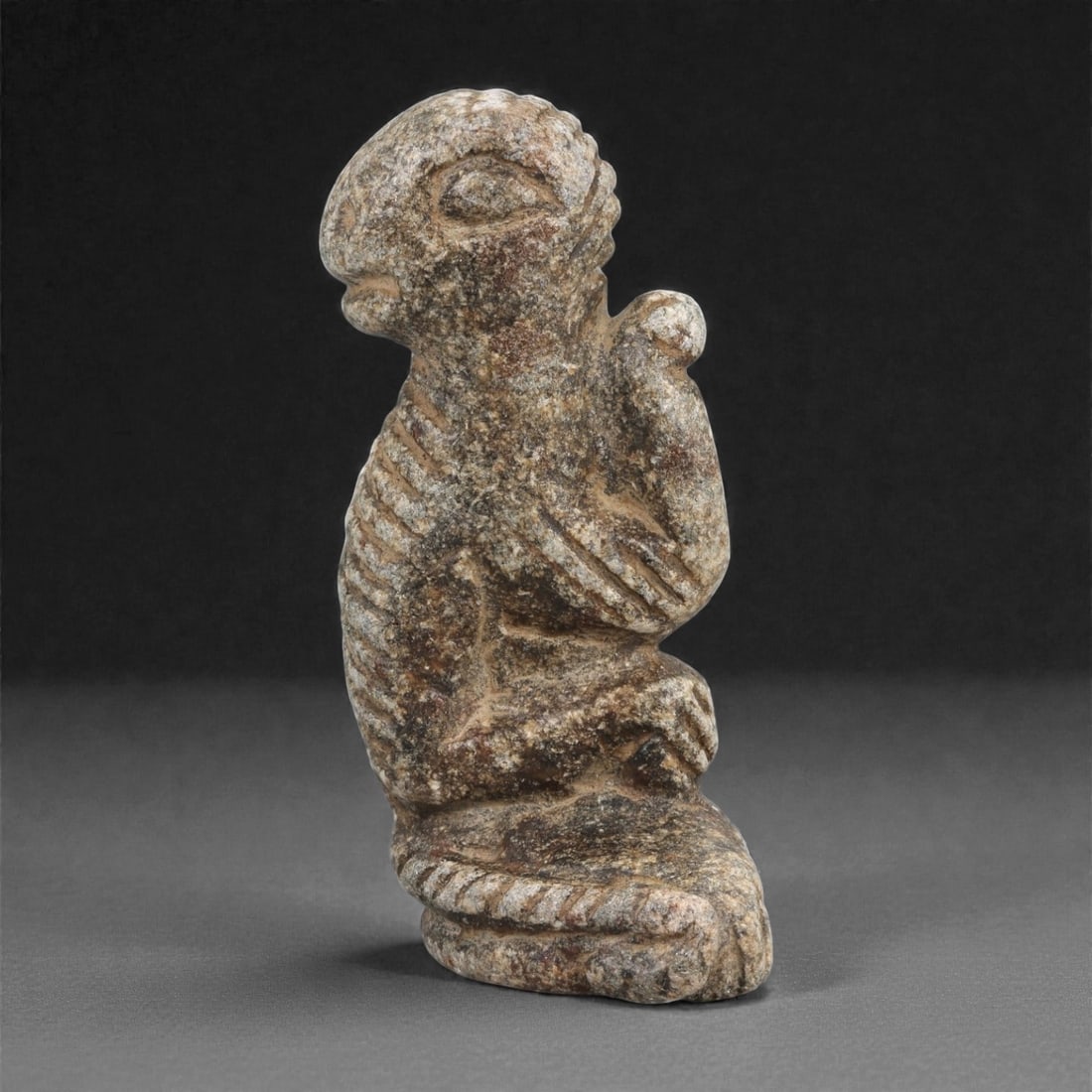 A Mesopotamian Schist Seated Anthropo-Zoomorphic Figure, Early 2nd Millennium BCE, 62LJ (1 of 2)