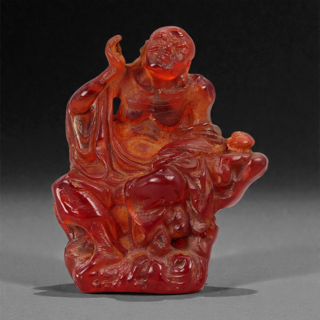 A Chinese Carnelian Figure of a Luohan, 20th Century, 38FD (1 of 3)