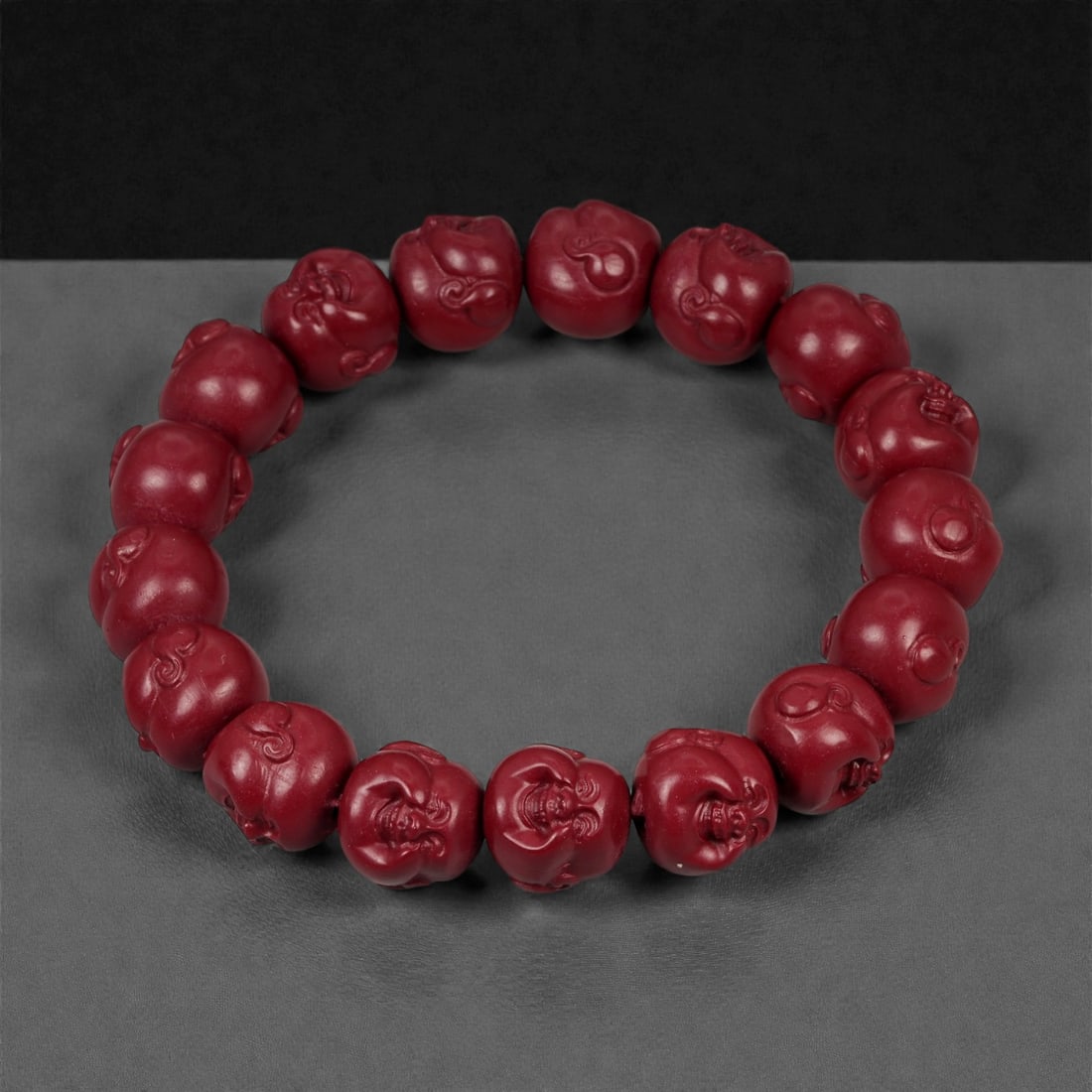 A Chinese Cinnabar Carved Bead Bracelet, 20th Century, 76FD (1 of 1)