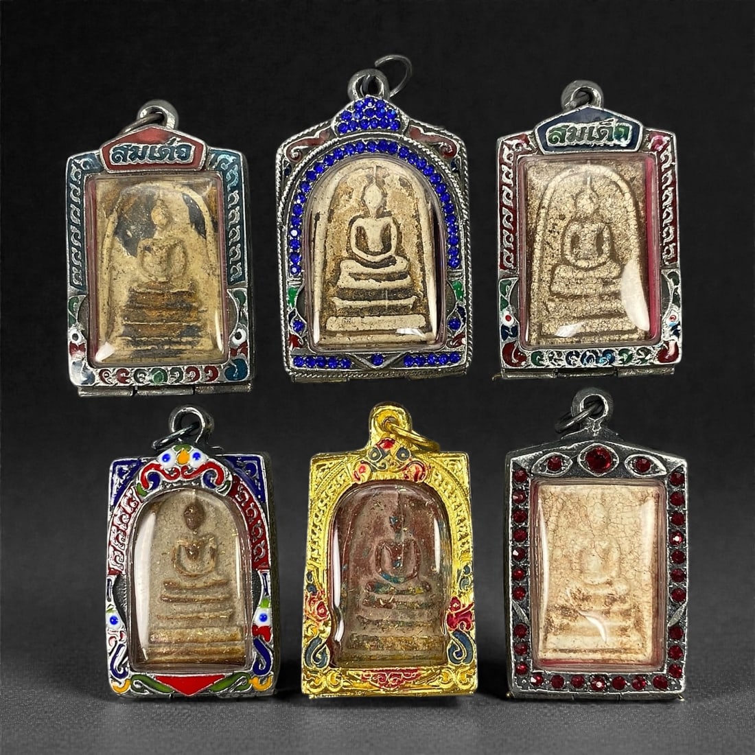 A Group of Six Thai Buddhist Amulets, 20th Century, 26XJ (1 of 2)