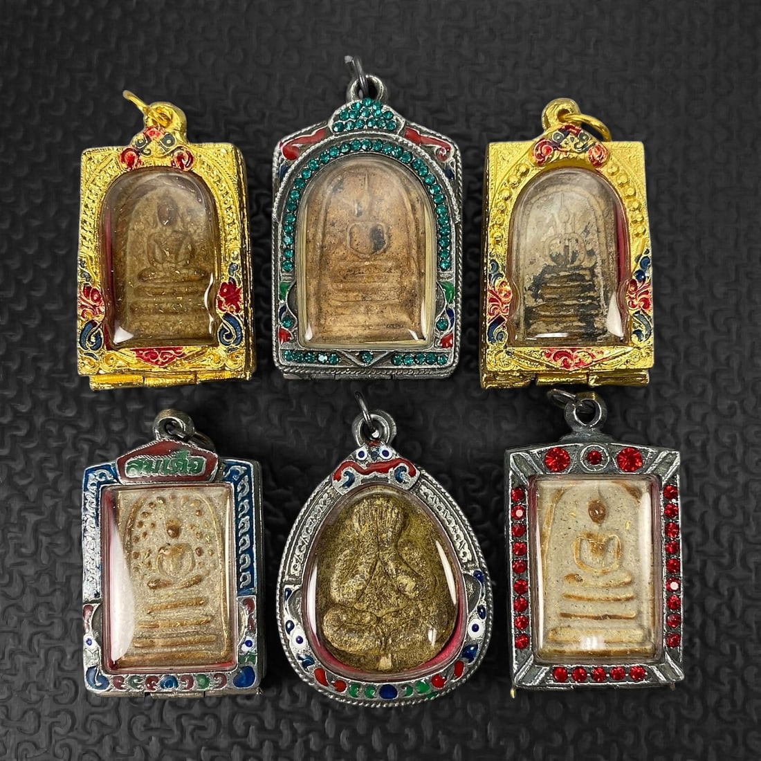 A Group of Six Thai Buddhist Amulets, 20th Century, 27XJ (1 of 2)