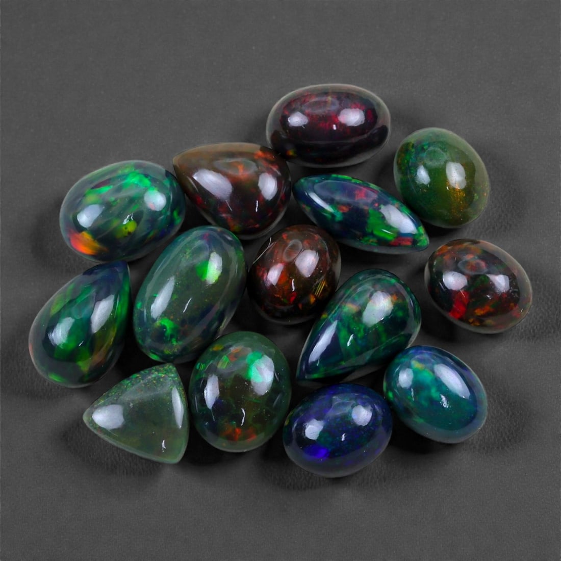 27.84 Carats of Ethiopian Welo Black Smoked Opal Cabochons, 53V (1 of 1)