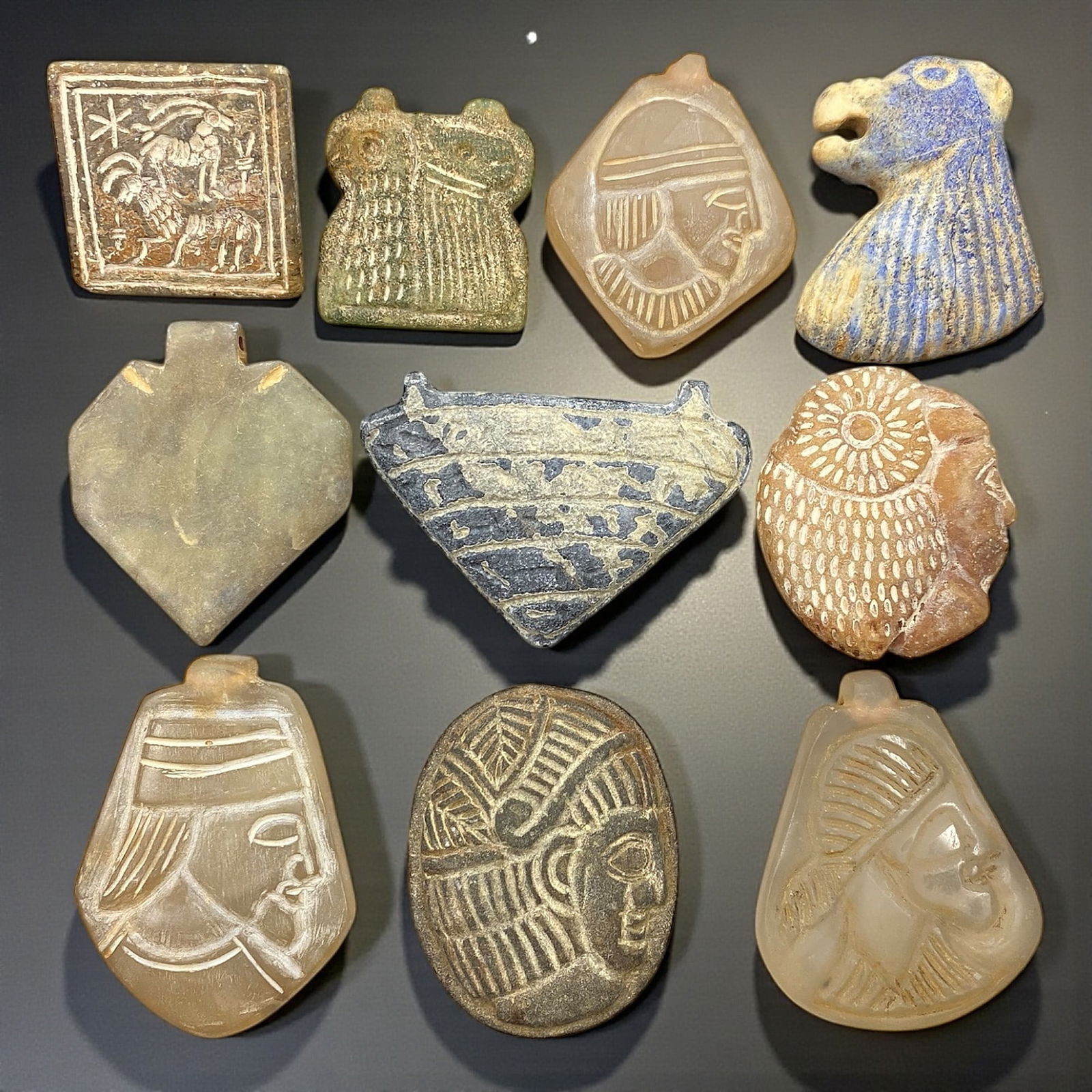 A Group of Ten Near Eastern Faience and Stone Amulets, First Millennium BCE, 63V (1 of 2)