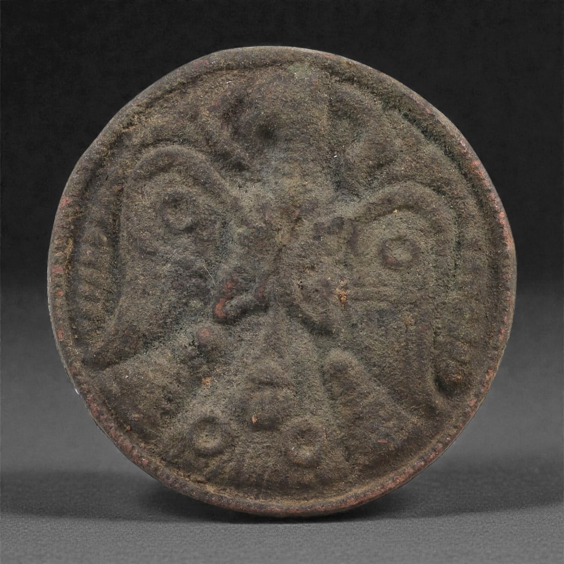 A Sasanian Bronze Stamp Seal with Winged Anthropomorphic Figure, 3rd-6th Century CE, 62LP (1 of 2)