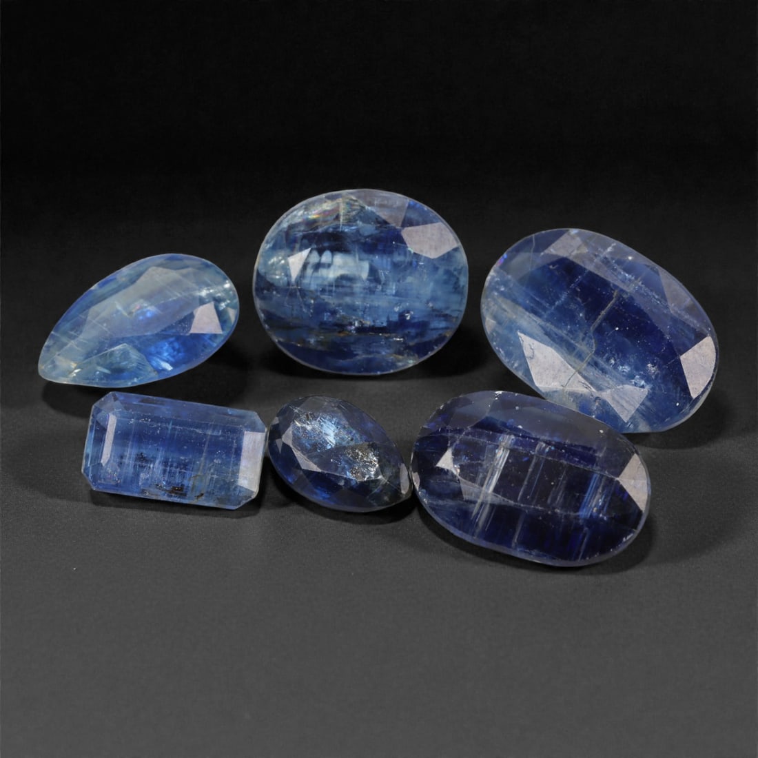 36.18 Carats Deep Blue Kyanite Lot 0.9-1.5cm - Natural Himalayan Stones, 36XJ: This striking parcel of deep blue kyanite showcases layered transparency and silken luster, with hues ranging from twilight indigo to icy sapphire blue. Each stone features natural pleochroism, reveal