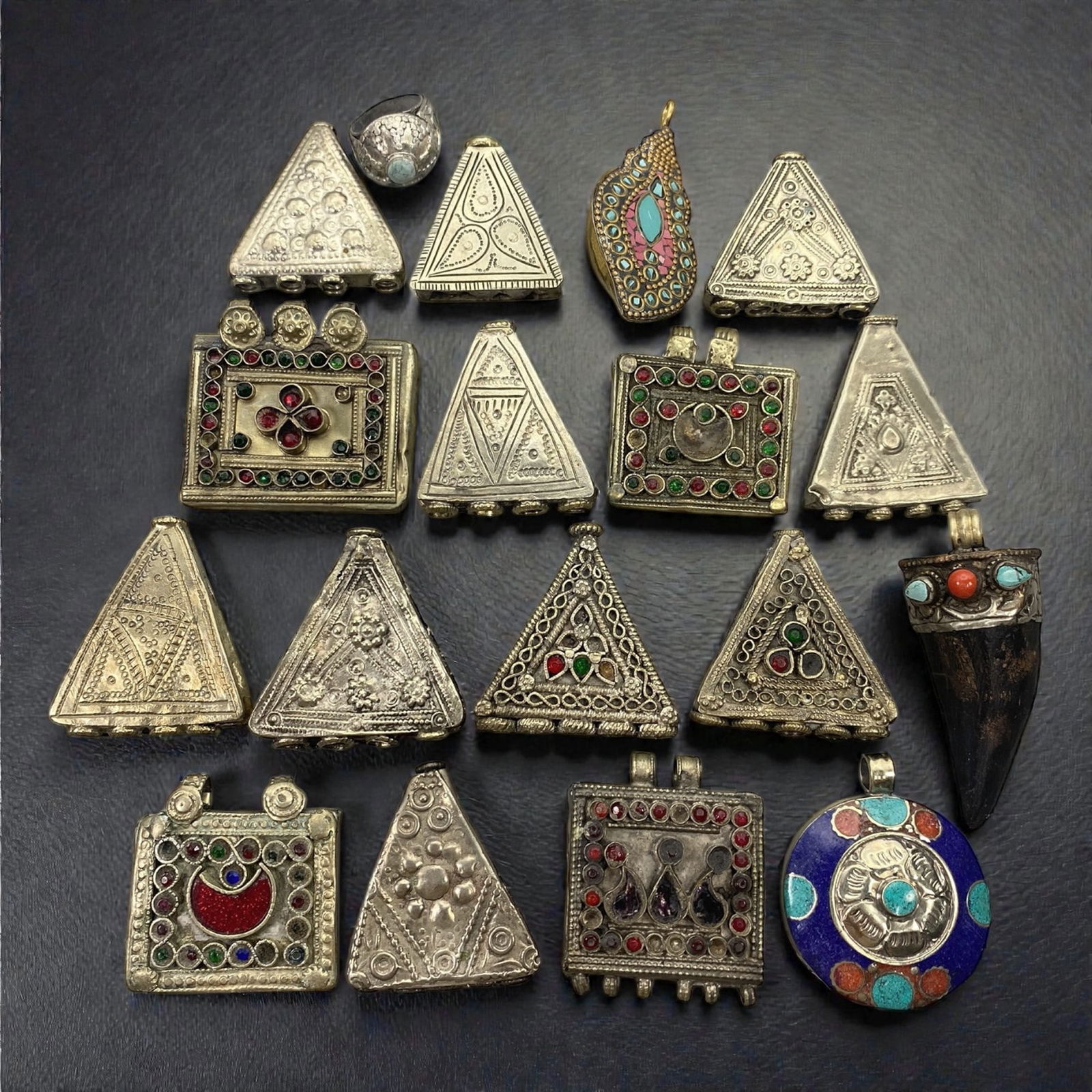 A Group of Central Asian Silver and Stone-Set Amulets, 20th Century, 82W (1 of 1)