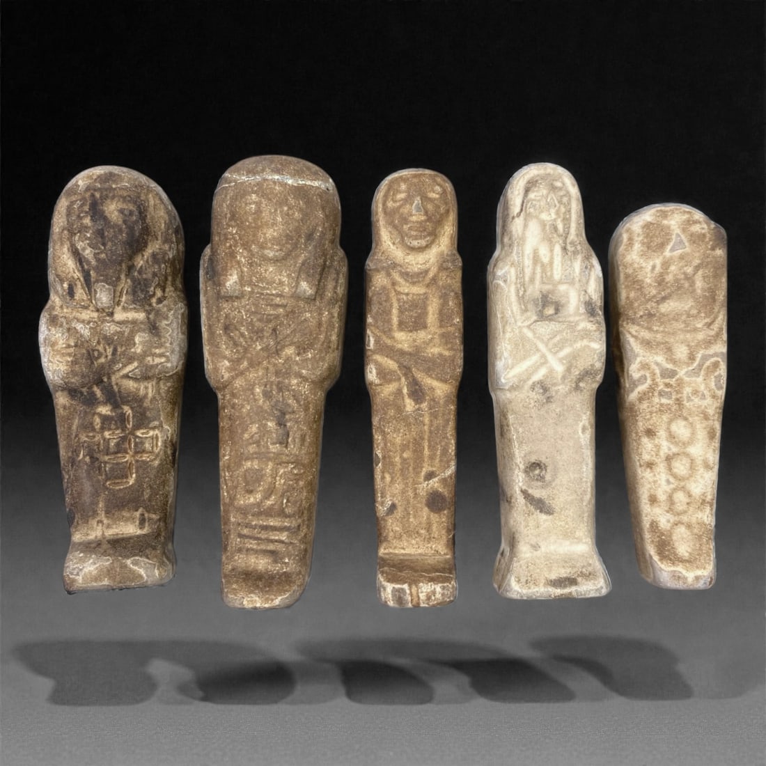 An Egyptian Revivalist Stone Shabti Group, 20th Century, 67Z (1 of 1)