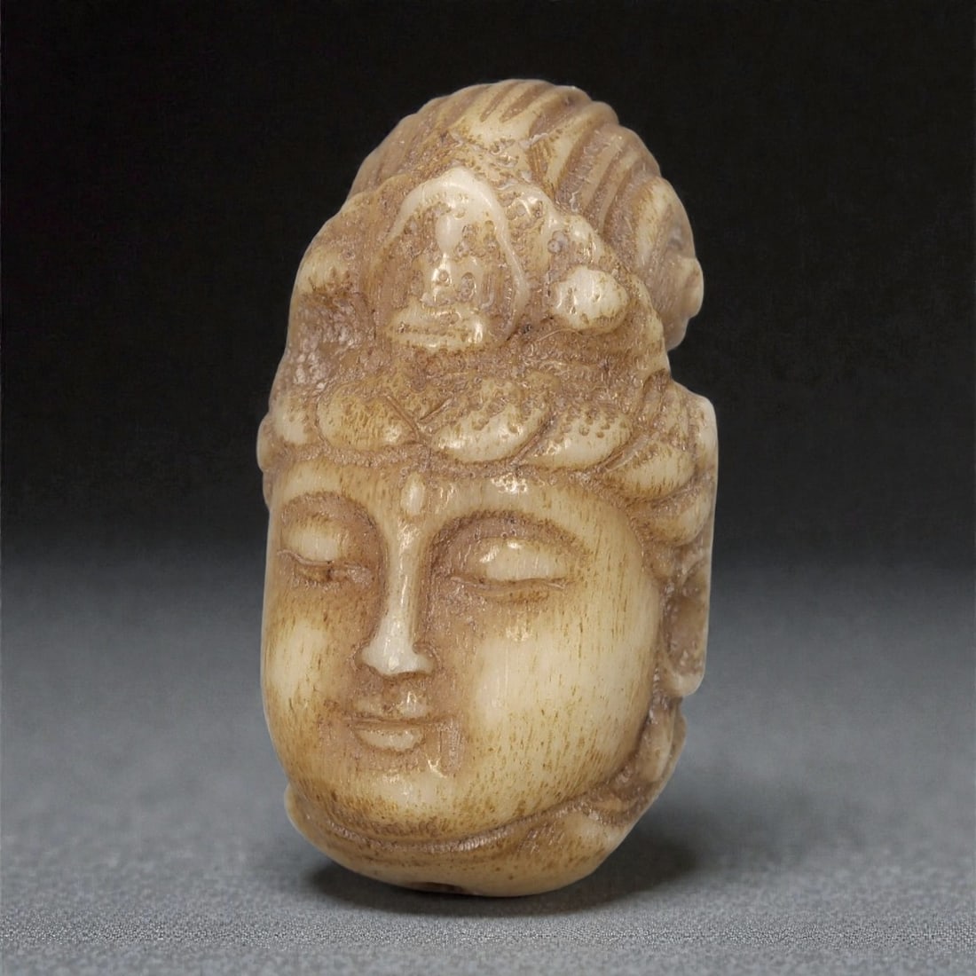 A Chinese Bone Bead Carved as a Buddhist Head, 19th-20th Century, 6FD (1 of 3)