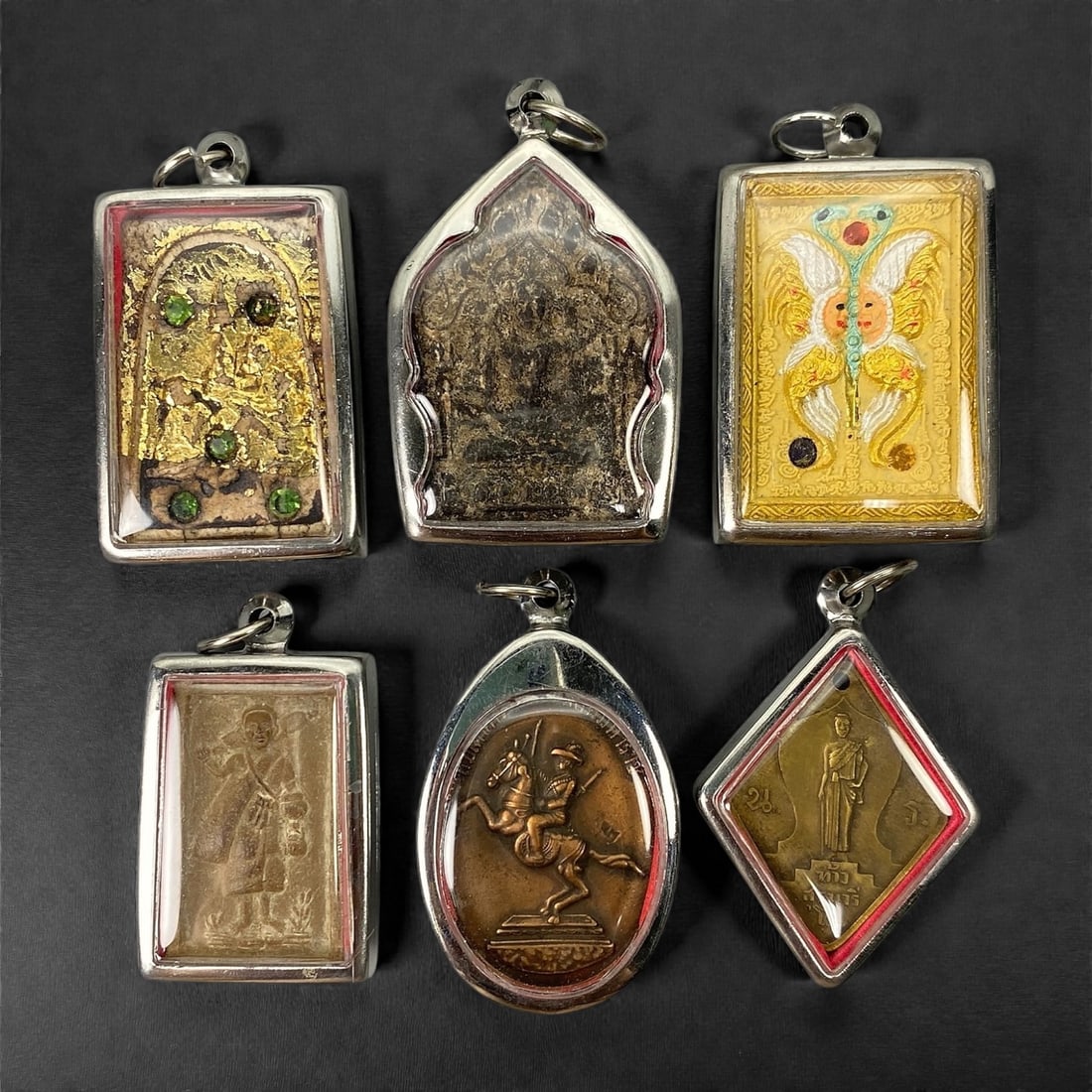 A Group of Six Thai Buddhist Amulets, 20th Century, 16XJ (1 of 2)