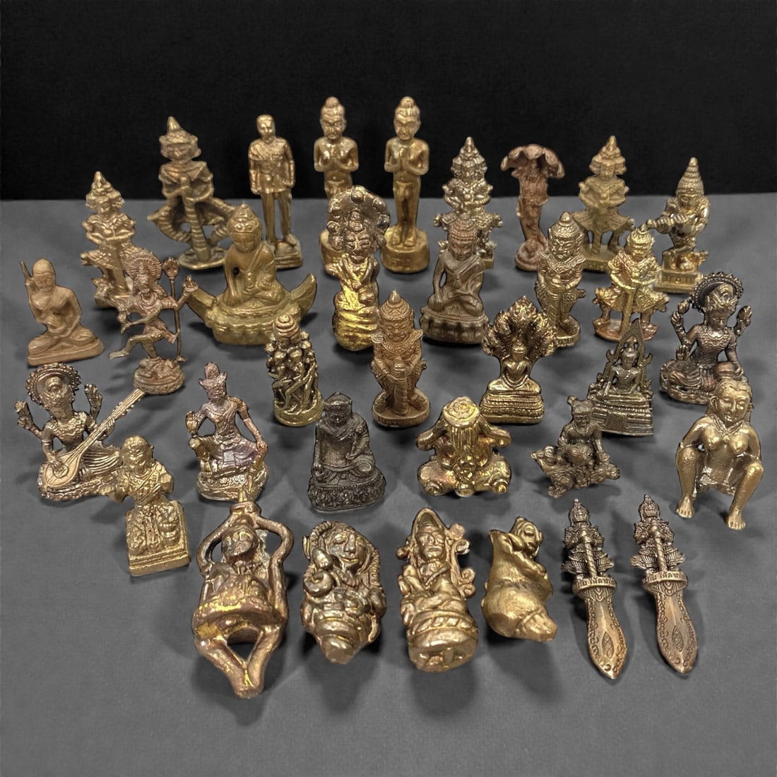 A Group of Thirty-Four Thai Copper Alloy Figurines, 20th Century, 6W (1 of 1)