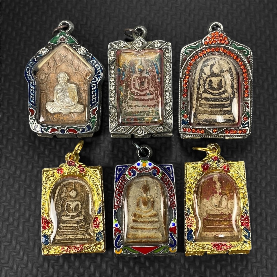 A Group of Six Thai Buddhist Amulets, 20th Century, 21XJ (1 of 2)