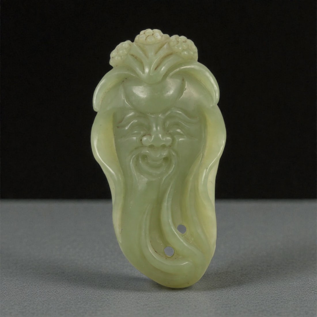 A Chinese Nephrite Jade Mask Pendant, 20th Century, 4FC (1 of 2)